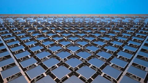 Solar Panel Array Under Clear Blue Sky Stock Footage 288979341