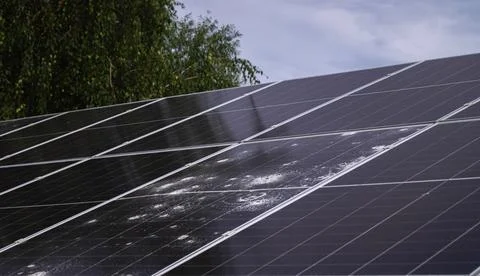 Solar panel array with visible hail damage, showing cracked photovoltaic ce.. Stock Photos