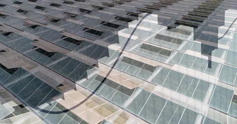 Solar panel array visualizing metrics on rooftop, showing rising line graph Stock Footage 307435676