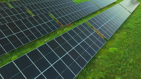 Solar Panel Arrays Across Lush Green Field Stock Footage 341388403