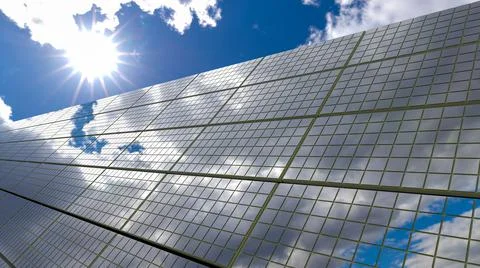 Solar panel background of photovoltaic modules for renewable energy. Clouds and Stock Illustration