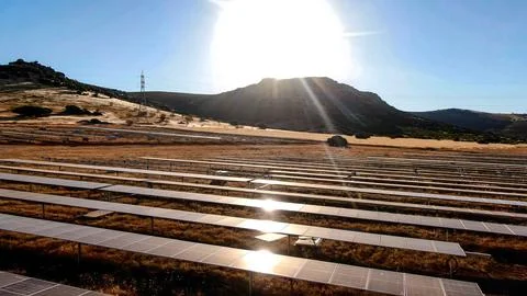 Solar panel bank in the process of producing efficient and renewable energy Stock Photos