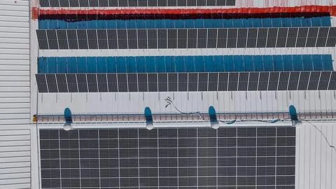 Solar panel bank in the process of producing efficient and renewable energy Stock Photos