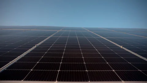 Solar panel cells on the green energy farm. Power generators produce electricity Stock Footage 309357801