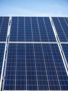 Solar panel closeup with blue texture lines. Solar renewable energy with el.. Stock Photos