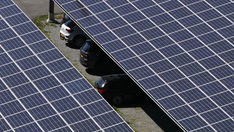 Solar panel covered parking lot with cars Stock-Footage 333452649