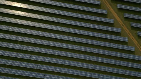 Solar Panel farm aerial flyover tilt up to Wind Farm Stock Footage 236012995