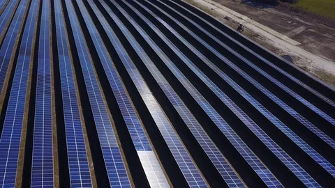 Solar Panel Farm aerial sun reflection on panels Stock Footage 101253740
