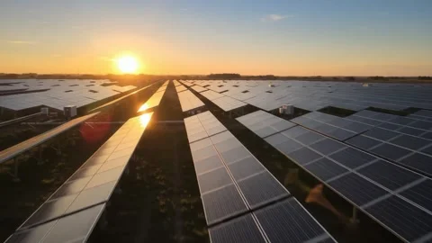 Solar Panel Farm Aerial View at Sunset, Renewable Energy Plant, Sun and Blue Sky Stock Footage 345832051