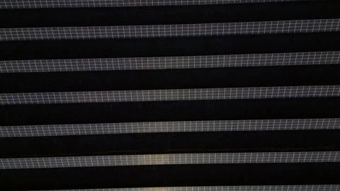 Solar panel farm, clean renewable energy from sunlight. Magic aerial view drone Stock Footage 325571412