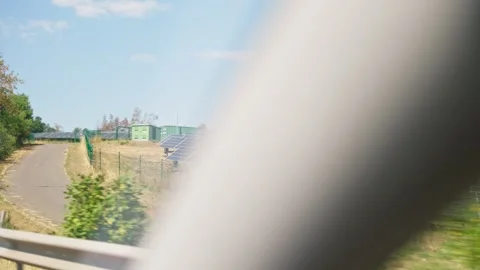 Solar Panel Farm With Electricity Pylon 库存影片 346216094
