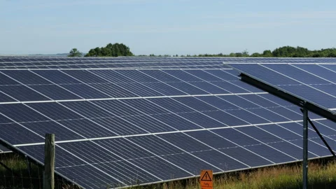 Solar panel farm generating clean renewable energy Stock Footage 339558427