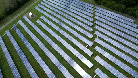 Solar Panel Farm Grid Electric Power Green Energy Plant with Drone Stock Footage 295508823