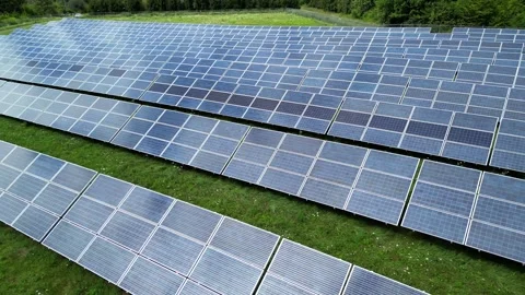 Solar Panel Farm Grid Electric Power Green Energy Plant with Drone Stock Footage 295508849
