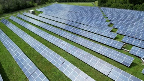 Solar Panel Farm Grid Electric Power Green Energy Plant with Drone Stock Footage 295509079