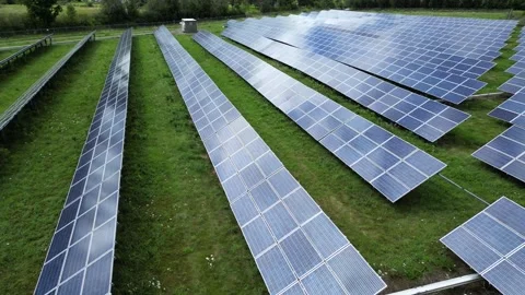 Solar Panel Farm Grid Electric Power Green Energy Plant with Drone Stock Footage 295509416