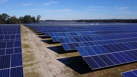Solar Panel Farm low aerial along rows Stock Footage 101252178