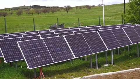 Solar panel farm producing renewable energy Stock Footage 339510091