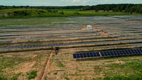 Solar panel farm provides clean, sustainable energy - drone parallax Stock-Footage 293670809