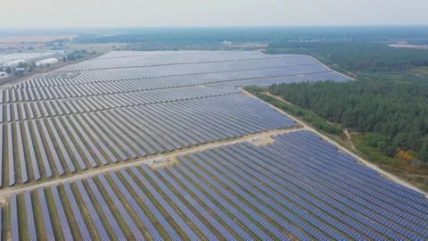 Solar panel farm seen from above, filmed by drone Видео 116779127