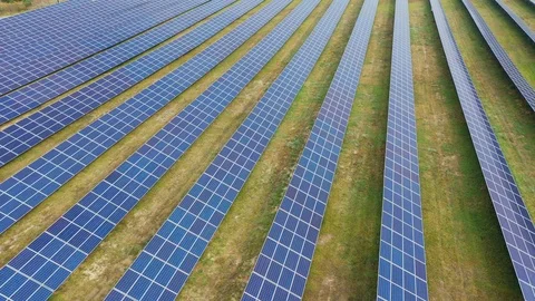 Solar panel farm seen from above, filmed by drone Видео 116779242