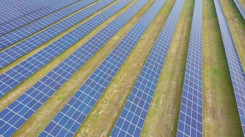 Solar panel farm seen from above, filmed by drone Видео 116779328