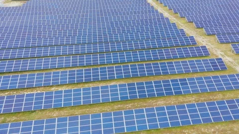 Solar panel farm seen from above, filmed by drone Видео 116779337
