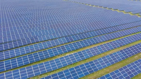 Solar panel farm seen from above, filmed by drone Видео 116779444