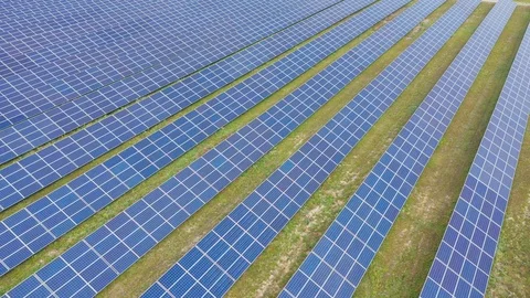 Solar panel farm seen from above, filmed by drone Видео 116779513