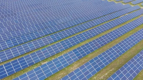 Solar panel farm seen from above, filmed by drone Видео 116779546