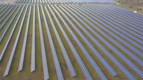 Solar panel farm seen from above, filmed by drone Stockbeeldmateriaal 116779894