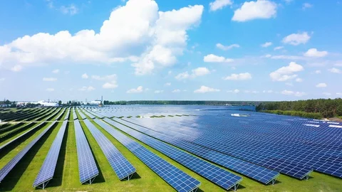Solar panel farm seen from above, filmed by drone 動画素材 129687451