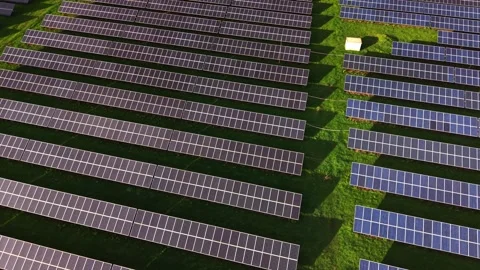 Solar panel farm viewed from above on sunny day Stock Footage 325090221