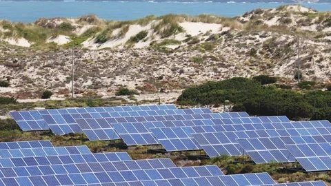 Solar panel field in natural outdoor environment producing renewable energy Stock Footage 320573322