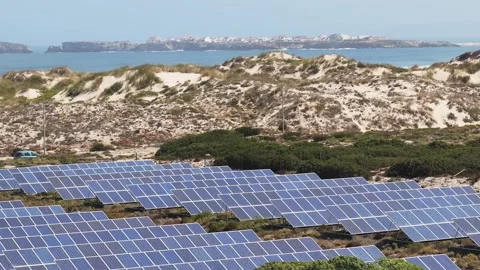 Solar panel field in natural outdoor environment producing renewable energy Stock Footage 320573338