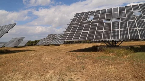 Solar panel field panning left Stock Footage 123981191