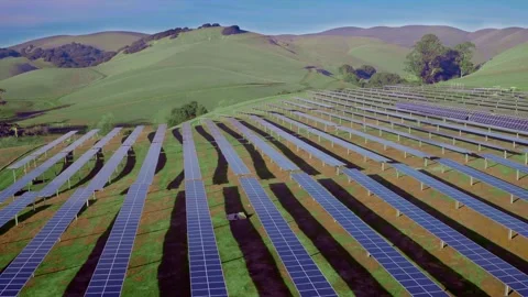 Solar Panel Field in Rolling Green Hillside Stock Footage 242297857
