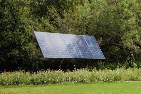 Solar panel in front of trees Stock Photos