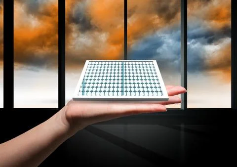 Solar panel on hand inside a building. Foto stock