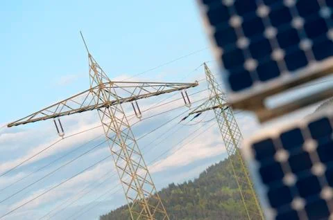 Solar panel with high voltage tower Stock Photos
