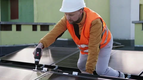 Solar panel installation on rooftop, clean energy concept. Stock Footage 319529448