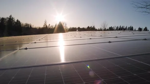 Solar panel installation with sunlight shining, solar power plant, green energy Stock Footage 240154799