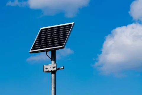 Solar panel installation under a clear blue sky Stock Photos