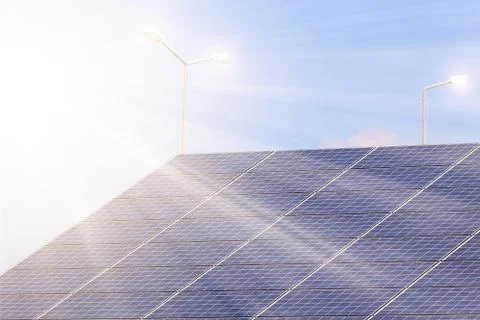 Solar panel is lit by the rays of the sun. Stock Photos