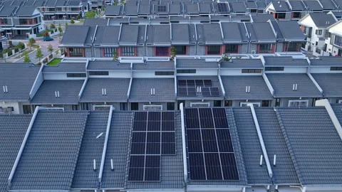 Solar Panel Malaysia Residences Drone View Backward- 4K Renewable Energy B-Roll Stock Footage 306529461
