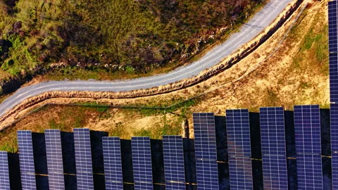 Solar panel modules on green grass from directly above, Bulgaria Stock Footage 336724180