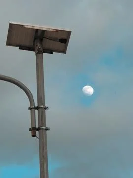 Solar Panel with Moon in Sky 스톡 사진
