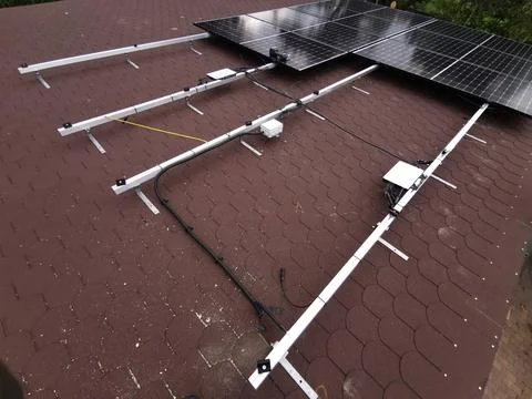 Solar panel mounting structure with microinverters Stock Photos