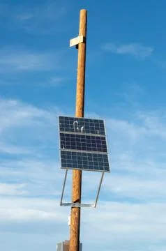 Solar panel on pole for powering camera Stock Photos