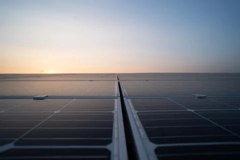 Solar panel power system clean energy at sunset Stock Photos